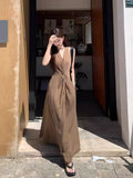 Seaside Vacation French Hanging Neck Sling Dress Women's Summer 2026 New High-End Temperament Waist Dress