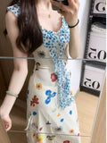 Lotus Leaf Fragmented Flower Sling Vacation Dress Women's Summer 2026 New Yunnan Sichuan West Tourism Gont Dress