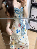 Lotus Leaf Fragmented Flower Sling Vacation Dress Women's Summer 2026 New Yunnan Sichuan West Tourism Gont Dress
