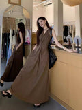 Seaside Vacation French Hanging Neck Sling Dress Women's Summer 2026 New High-End Temperament Waist Dress