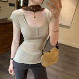 French Small Investment Beautiful U Collar Wood Ear Button Short-Sleeved T-Shirt 2026 New Design Sense Niche Top