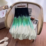 2025 New High-Rise Half-Dress Woman Tight Waist Ink Print Design Sense A-Character Skirt In The Long Folded Skirt