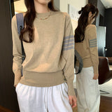 2026 Into The Spring To Take The Bottom Of The Knitted Shirt Women's Autumn And Winter New Cuff Hem Buckle Waist Loose Top
