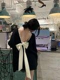 Black Bow With Bare Back V-Necked Sweater Women's Autumn/Winter 2026 New Lazy Wind High Sense Loose Knitting Top