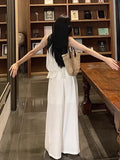 French Temperament Sleeveless Lotus Leaf Side Hanging Neck Vest Top Female Design Sense Loose Broad Legs Long Pants Set Summer