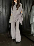 Autumn And Winter Fashion High-End Lazy Wind Bat Sleeve Loose Knitted Sweater + Sleeve + Broad Leg Pants Three-Piece Set