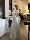 French Green Open-Shouldered Net Yarn Dress Women's Summer 2026 New Temperament Is Beautiful Pocketed And Hip Dress