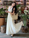 French Hanging Neck V-Neck Sleeveless Dress Women's Summer 2026 New Temperament To Receive The Waist Thin Hourglass Waist Long Skirt