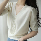 Short-Sleeved Ice Silk Knitted Women's 2026 Summer New Pearl Buckle Design Small Loose Thin Top