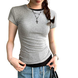 2026 Early Spring Temperament Korean Niche Round Collar Shoulder Short-Sleeved T-Shirt Female Commute Summer White Explosion