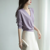 Short-Sleeved Ice Silk Knitted Women's 2026 Summer New Pearl Buckle Design Small Loose Thin Top