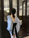 Black Bow With Bare Back V-Necked Sweater Women's Autumn/Winter 2026 New Lazy Wind High Sense Loose Knitting Top